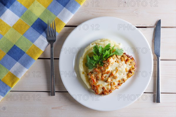 Top view of plate with chopped meat with potato