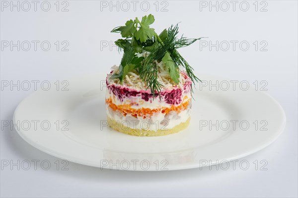 Traditional russian salad herring with beetroot