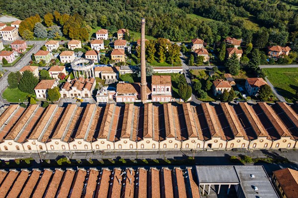 Aerial of the Unesco world heritage site "company town". Crespi dÂ´Adda