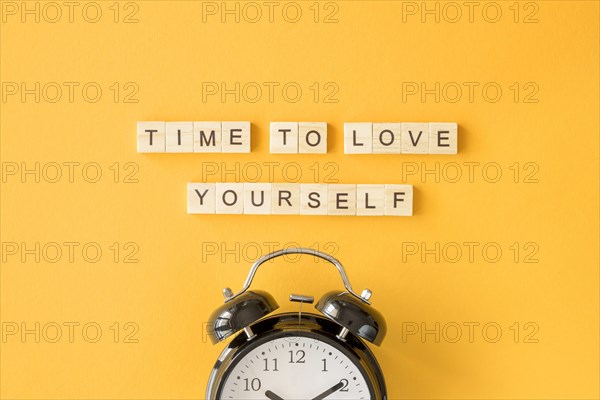 Letter cubes arrangement with clock