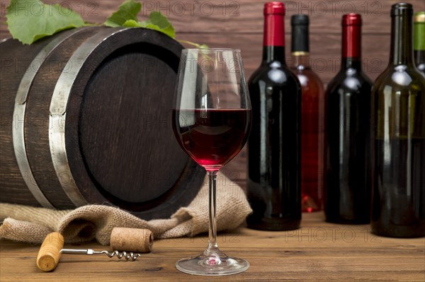Wooden barrel with bottles glasses wine. Resolution and high quality beautiful photo