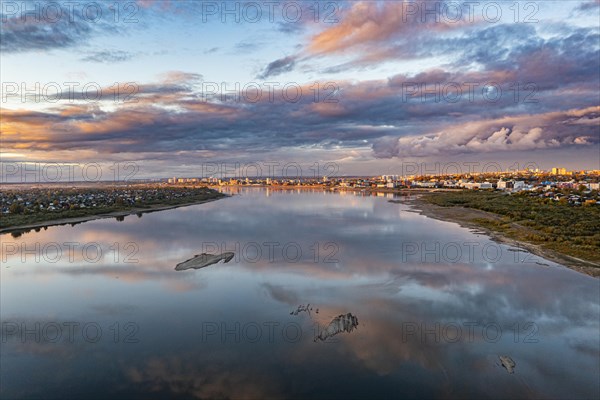 Cloud reflections on the Tom river