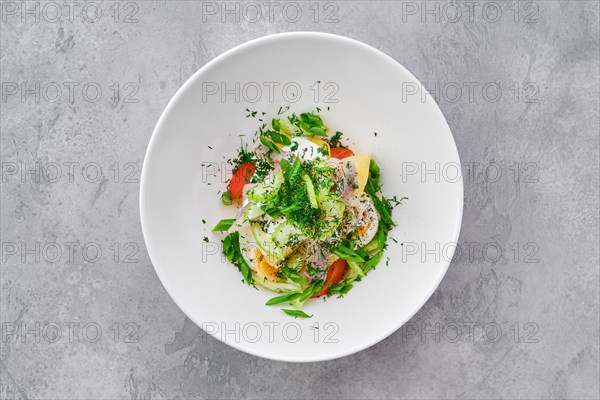 Top view of salad with herring