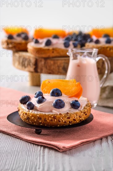 Closeup view of sweet buns with yogurt