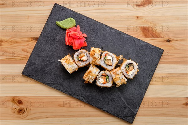 Rolls with tuna and avocado on slate plate