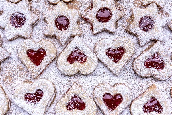 Freshly baked Spitzbuben in the shape of a heart