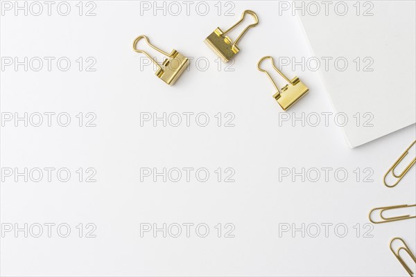 Top view golden paperclips with copy space. Resolution and high quality beautiful photo