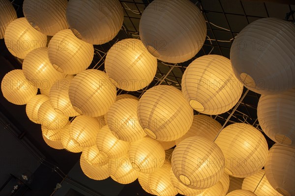 Bunch of paper lantern lamps in the display