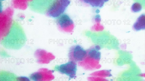 Colorful gradient tie dye fabric surface