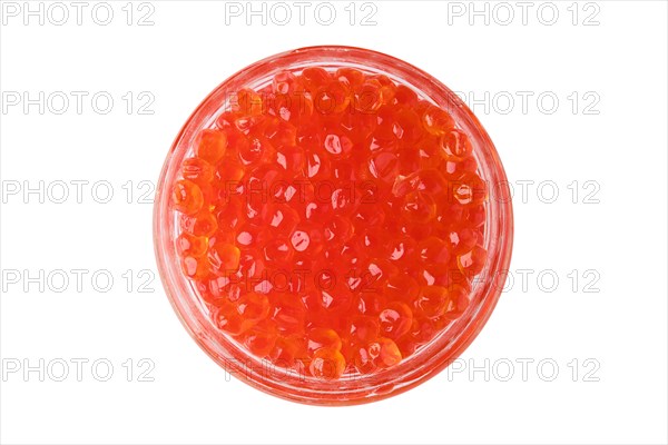 Overhead view of open jar with red caviar isolated on white