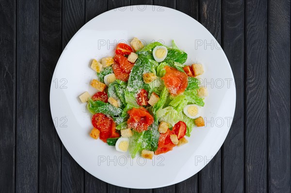 Top view of salad with quail egg