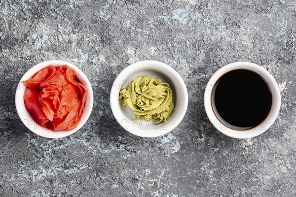 Flat lay ginger wasabi soy sauce bowls