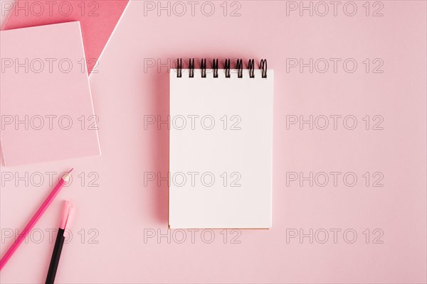 Notepad office supplies colored surface
