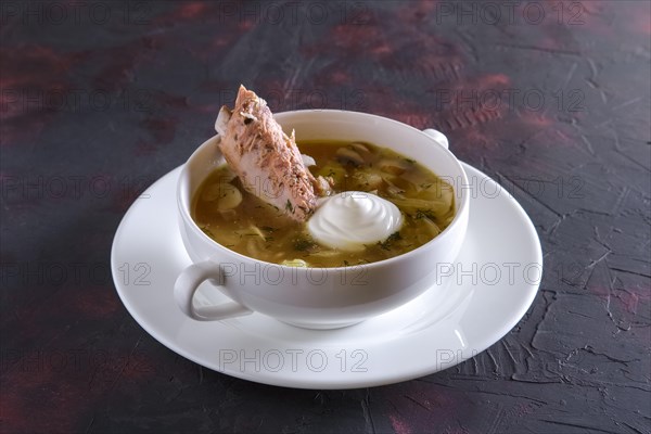 Beef bouillon with meat on a bone