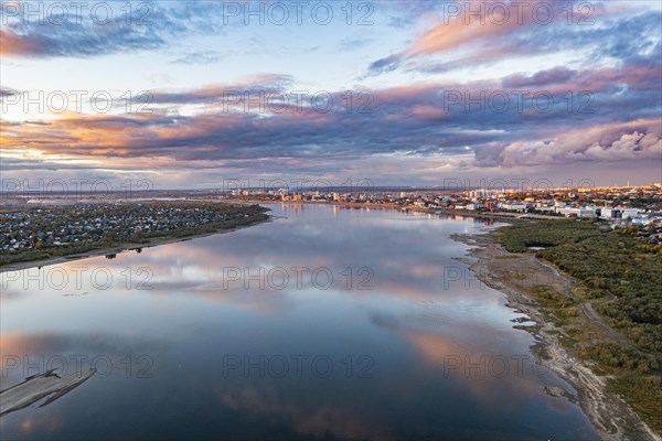 Cloud reflections on the Tom river