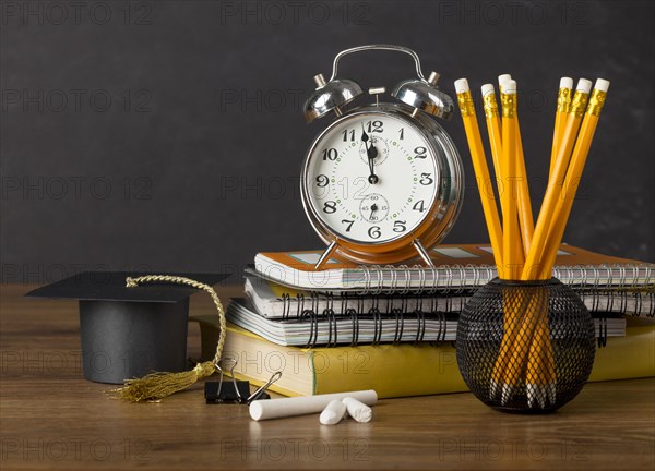 Front view education day arrangement table with clock