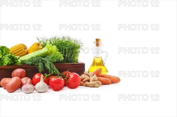Heap of fresh vegetables and herbs on white background. World vegan day concept