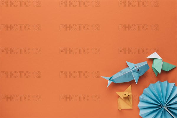 Creative decorative origami art corner orange backdrop