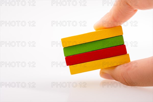 Colorful Domino Blocks in a line on a white background