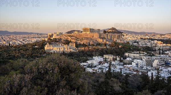 View from Philopappos Hill over the city at sunset