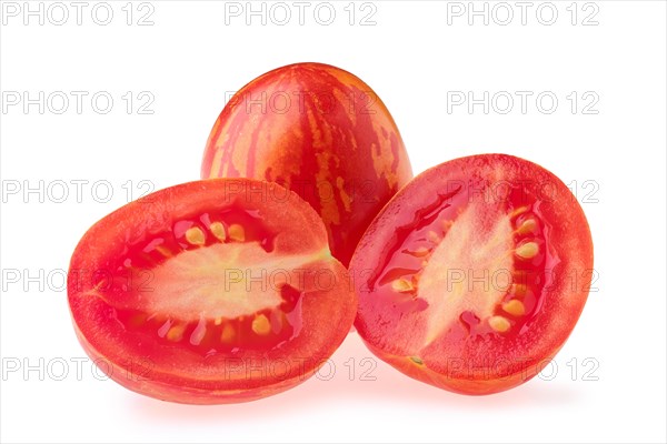 Fresh whole and half tomatoes Russian queen isolated on white background