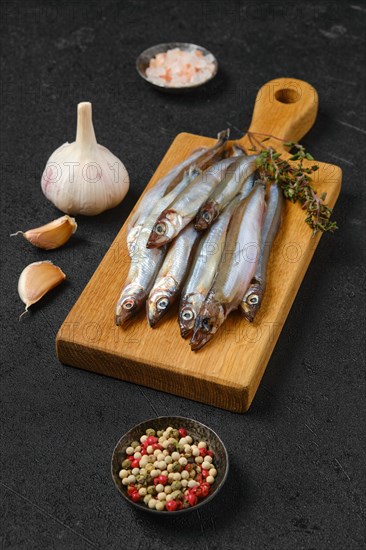 Pile of fresh raw frozen capelin