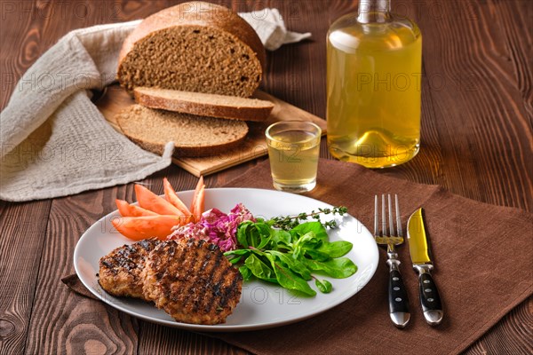 Grilled beef cutlet with fresh salad