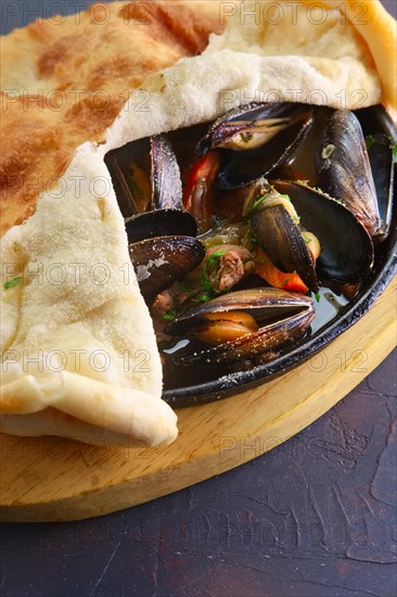 Baked oysters covered with bannock