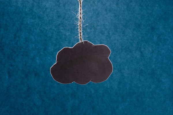 Black cloud on a blue background