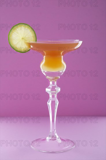 Cocktail brown derby on violet background