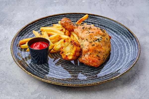 Baked chicken thigh with french fries