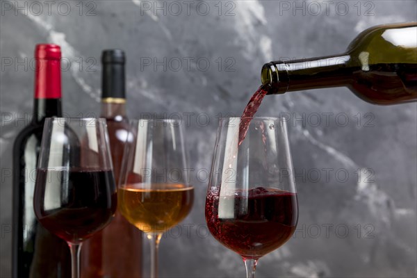 Wine bottle filling wineglass. Resolution and high quality beautiful photo