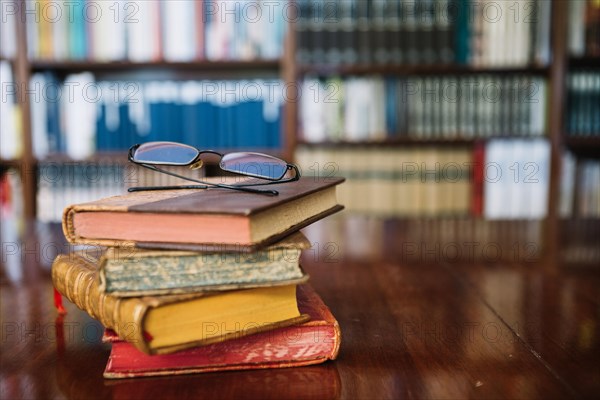 Glasses old books library