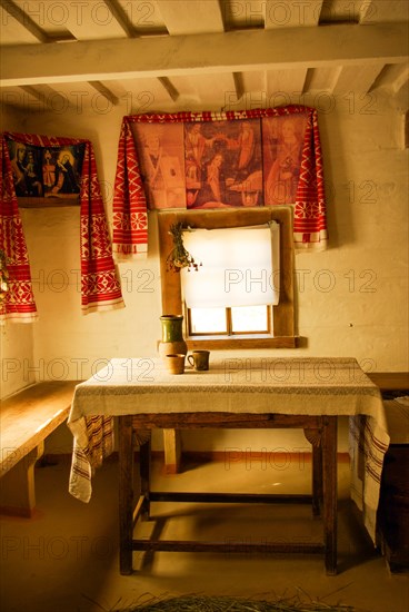 Interior of a traditional ukrainian rural cottage with a straw roof