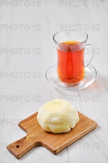 Sweet dessert mochi with banana and chocolate with fruit tea