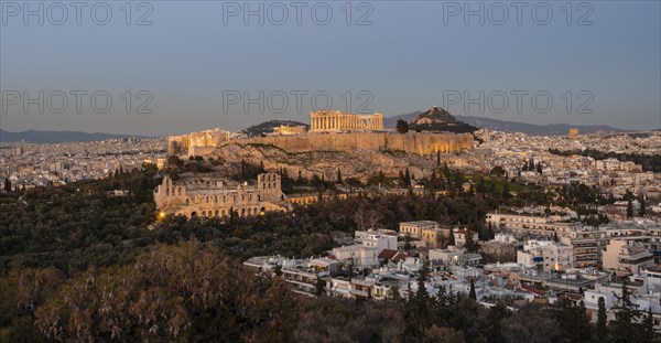 View from Philopappos Hill over the city at sunset