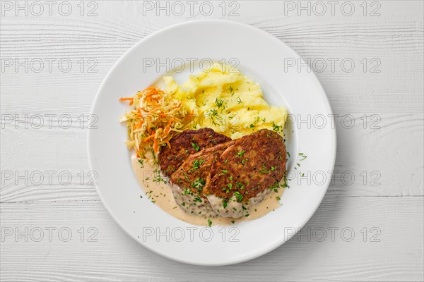 Top view of plate with liver cutlet