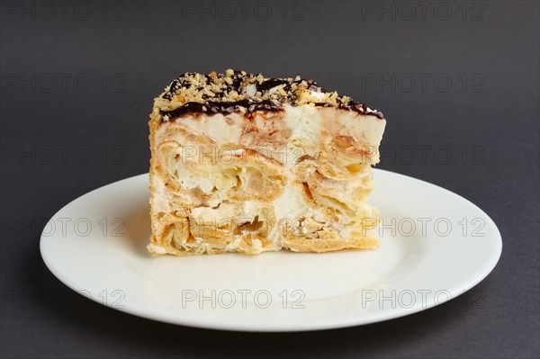 Napoleon layered cake with pastry cream. Close up view