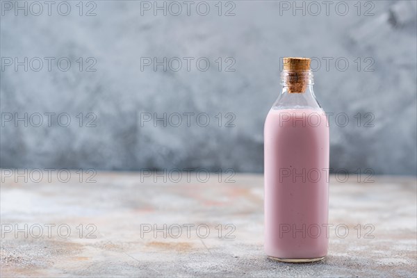 Bottle of homemade blueberry yogurt