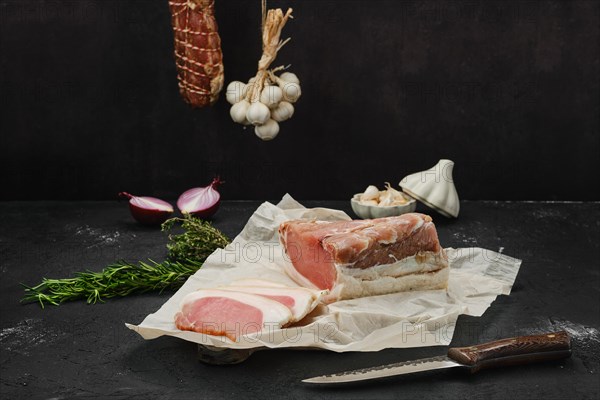 Smoked beef ham on wooden cutting board