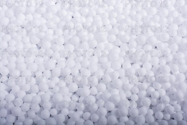 White little polystyrene foam balls as background