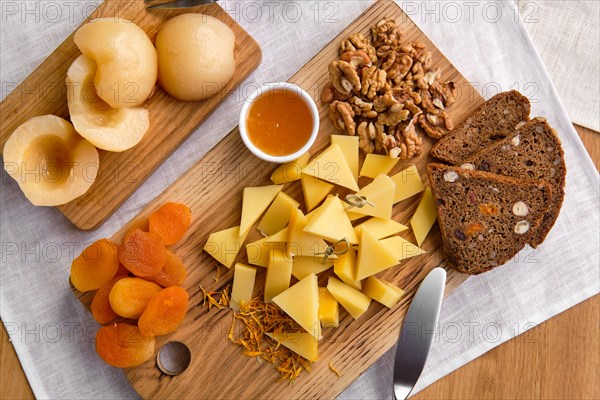 Overhead view of set of various appetizers for wine