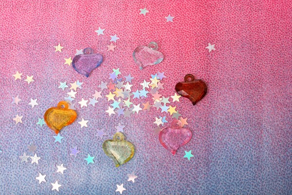 Colorful heart shape beads and tiny stars as love concept