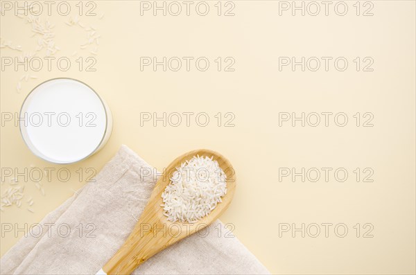 Top view rise spoon with milk copy space. Resolution and high quality beautiful photo