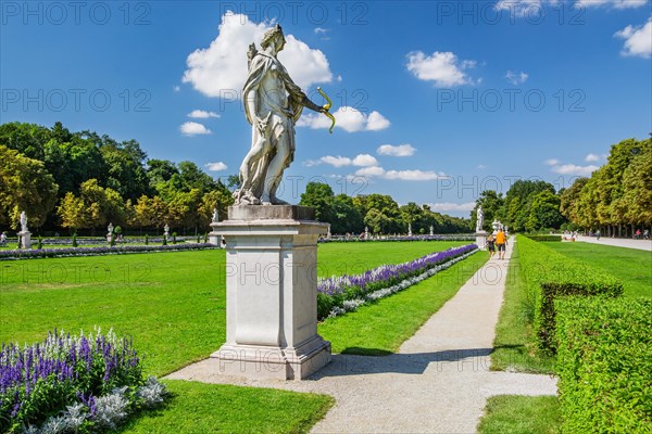 Baroque garden parterre with sculptures in the palace park of Nymphenburg Palace