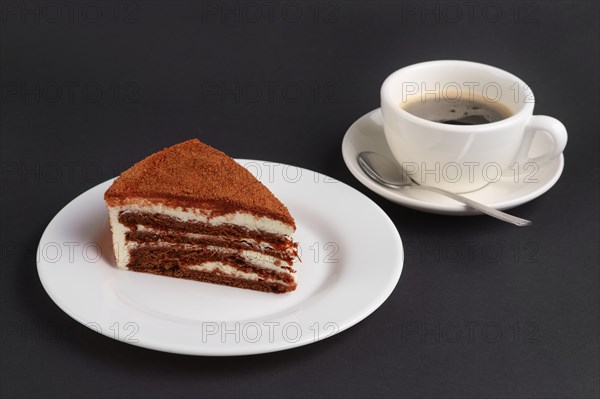 Chocolate biscuit cake and cup of coffee