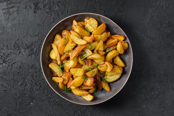 Top view of plate with roasted potato wedges