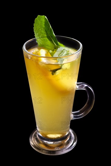 Cold citrus tea isolated on black background