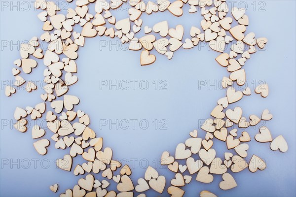 Wooden hearts form heaart shape as love concept