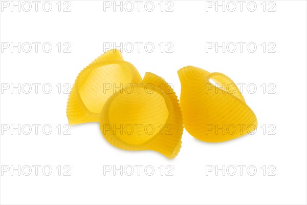 Pipe rigate pasta. Organic whole wheat grooved pipes isolated on white background